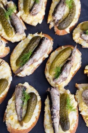 Egg & Sprats Canapes on a cutting board
