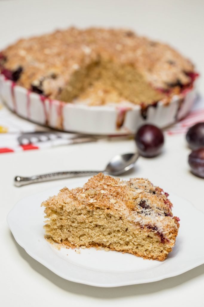 Slices of traditional plum cake on ceramic plate. Plate with slices of  homemade plum cake with almonds and spicy plum on a | CanStock