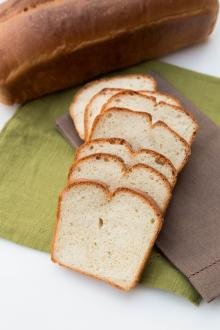 White Country Bread cut into slices and layed out in row