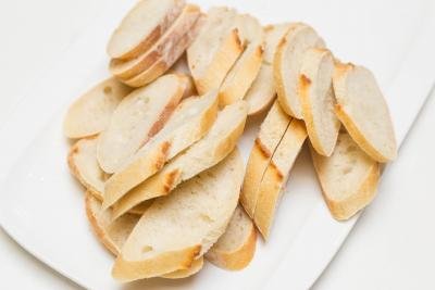 Sliced up baguette in a plate