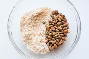 toasted coconut, almonds and pistachios in a bowl