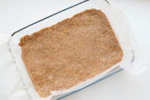Sugar-Free Coconut Bars mixture pressed into a baking pan