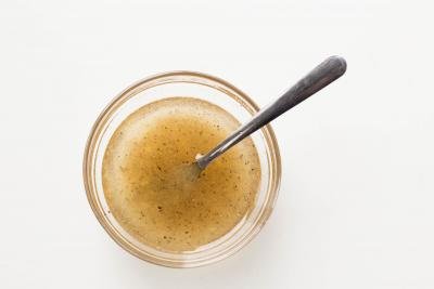 Salad dressing in a little bowl