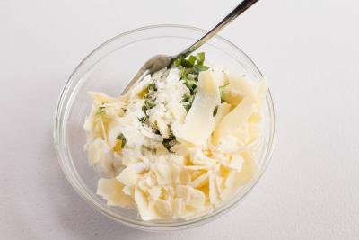 Ricotta, parmesan, basil, garlic salt and garlic in bowl