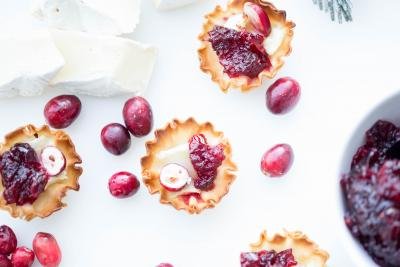 Brie and Cranberry Bites on a cutting board