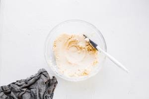 Batter mixture in a bowl with a spatula