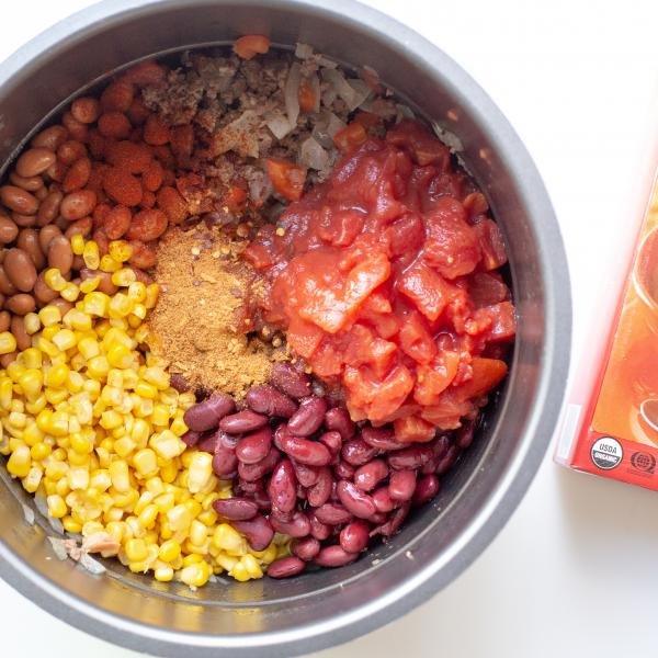 Chili ingredients in a slow cooker.