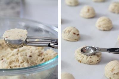 Dough in a scoop, second tray with cookies.