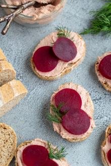 Smørrebrød with beets and pate on a tray