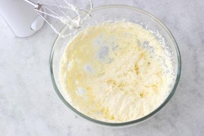 Butter whisked in a mixing bowl.