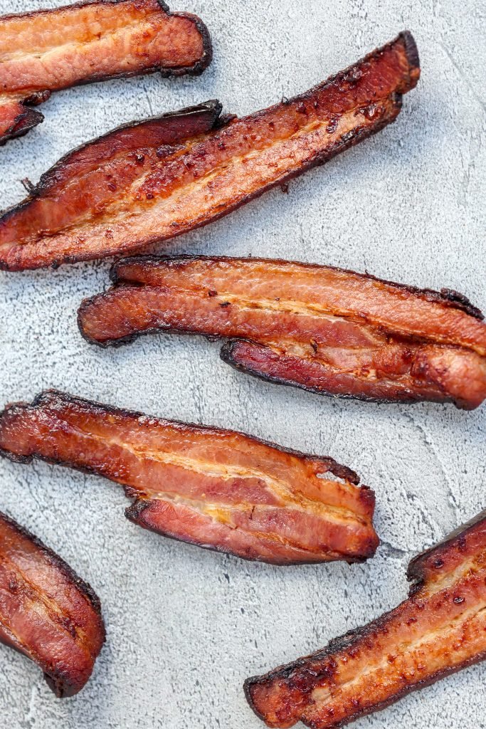 Crispy bacon on a baking tray