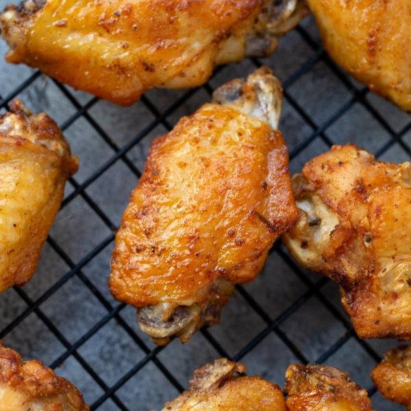 Air Fryer Chicken wings in a cooling tray