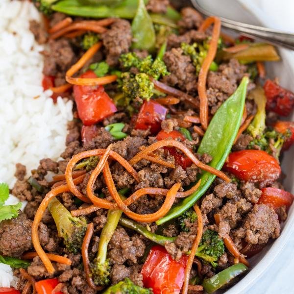 Korean Beef Stir Fry in a bowl with rice