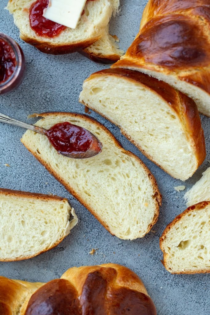 Brioche bread slices on a tray with jam