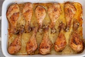 Baked chicken legs on in a dish