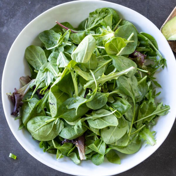 Green leaves in a bowl.