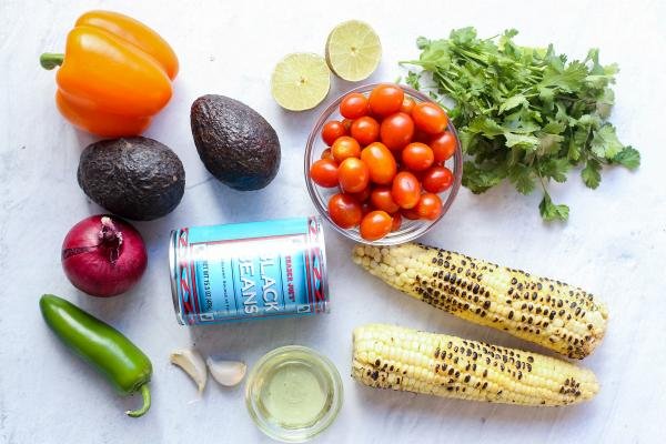 ingredients on a counter for Black bean and corn salsa
