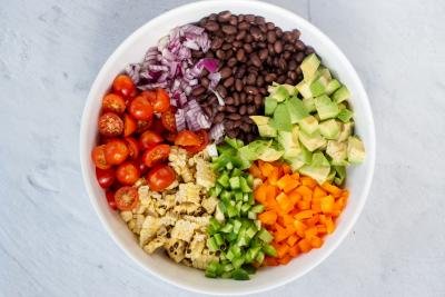 All ingredients for the black bean and corn salsa in a bowl