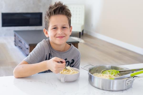 Jacob with a bowl of pasta 