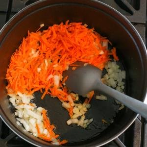 Carrots and Onions cooking in a pot