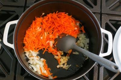 Carrots and Onions cooking in a pot