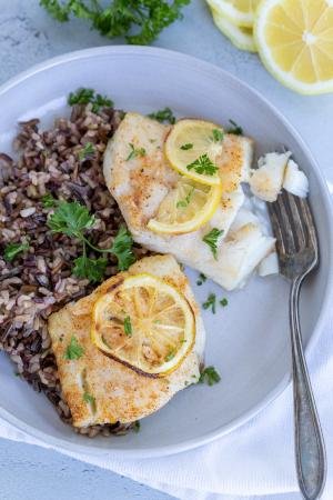 Crispy Air Fryer Cod in a plate with rice