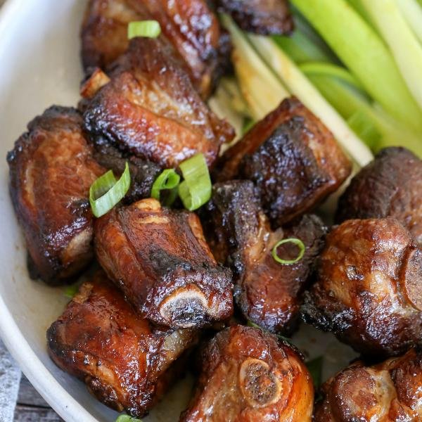 Pork Ribs in a plate with green onions