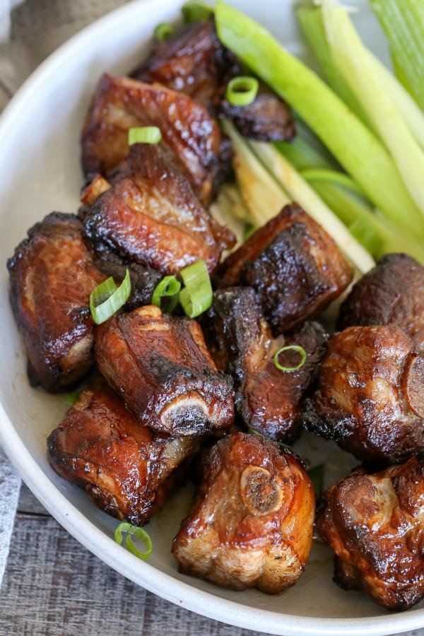 Pork Ribs in a plate with green onions