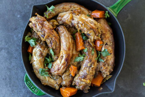 Baked Turkey Necks in a pan.