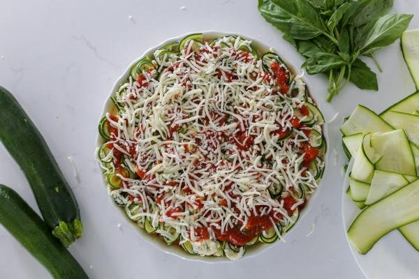 zucchini lasagna roll ups in a baking dish