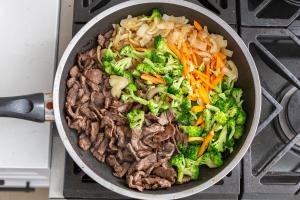 beef and vegetables in a skilet