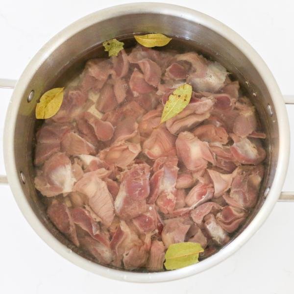 Chicken gizzards in a pot with water