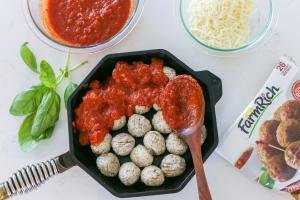 Meatballs with Marinara sauce in a cooking pan