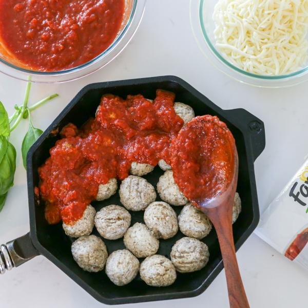 Meatballs with Marinara sauce in a cooking pan