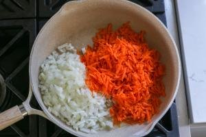 carrots and onion in a skillet