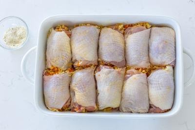 Chicken stuffed with rice in a baking dish