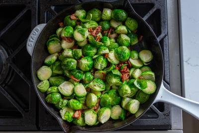 Brussel Sprouts in a skillet with bacon