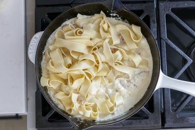 cream with pasta in a skillet