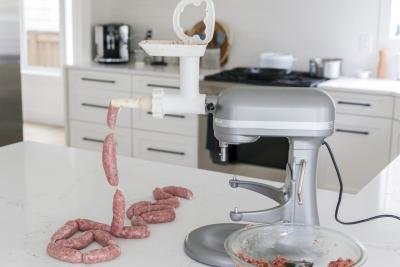 Sausages being made with a kitchen aid