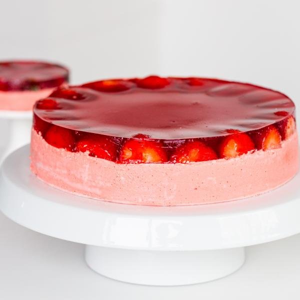 Strawberry Jello Cake on a stand