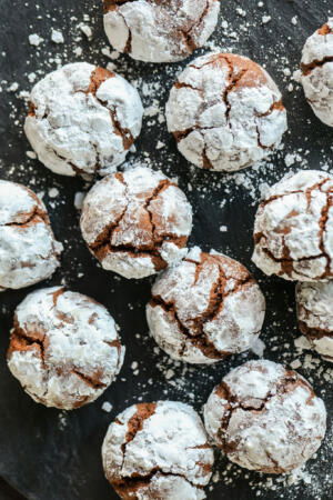 Chocolate Crinkle Cookies on a sheet.
