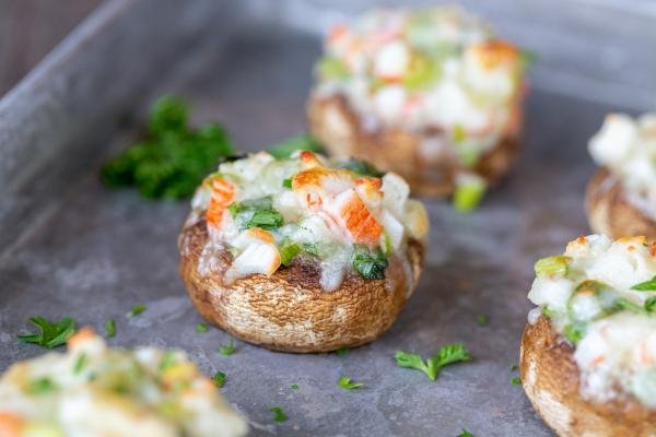 stuffed mushrooms on a baking sheet