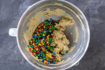 M&M Cookie dough in a mixing bowl.