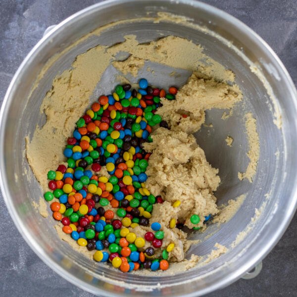 M&M Cookie dough in a mixing bowl.