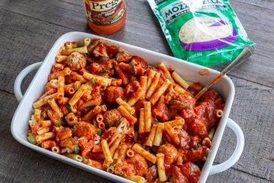 Ziti with sauce in a baking dish