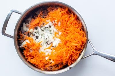 Beef carrots and onion in a frying