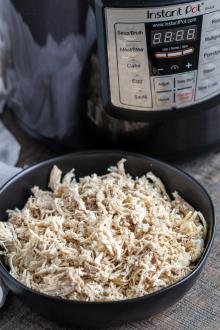 Bowl of shredded chicken in a bowl