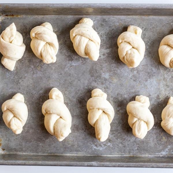 garlic knots on a baking sheet