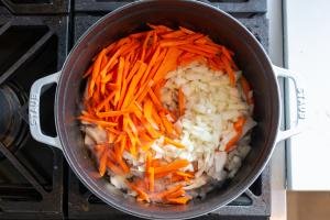 Carrots and onion in a pan