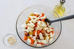 chicken with potatoes and carrots in a bowl